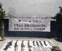 Aseguran ametralladora, fusiles y vehículos con insignias criminales en Michoacán